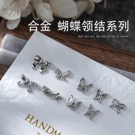 The alloy butterfly bow tie series of nail art accessories is a popular three-dimensional bestseller. It is a high-end and light luxury nail accessory with a butterfly diamond pattern The alloy butterfly bow tie series of nail art accessories is a popular three-dimensional bestseller. It is a high-end and light luxury nail accessory with a butterfly diamond pattern